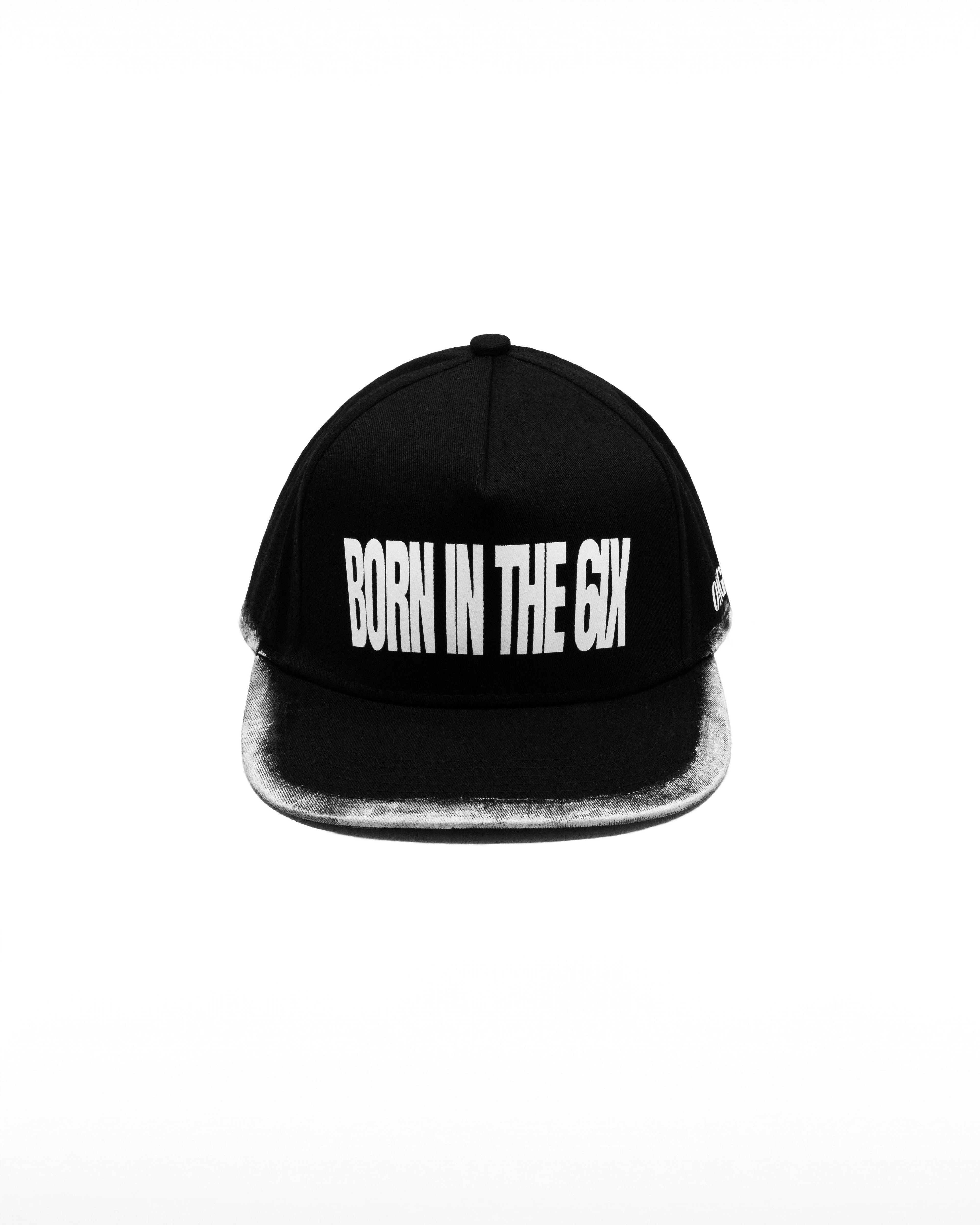 Black cap with 'BORN IN THE 6IX' text on a white background