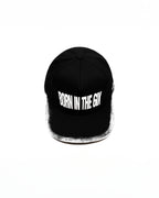 Black cap with 'Born in the 6IX' text on a white background