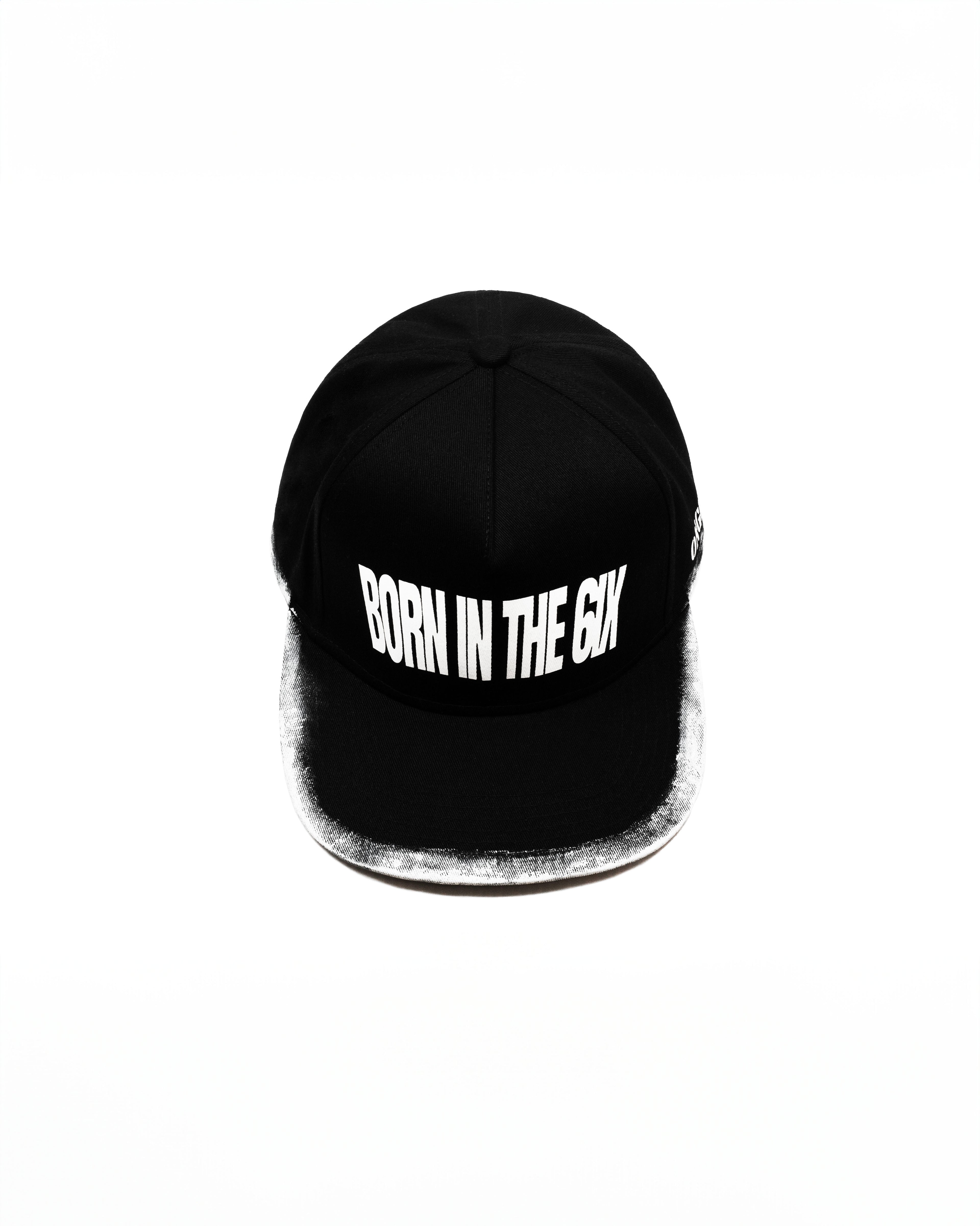 Black cap with 'Born in the 6IX' text on a white background