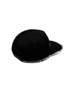 Black ONGNA cap on a white background