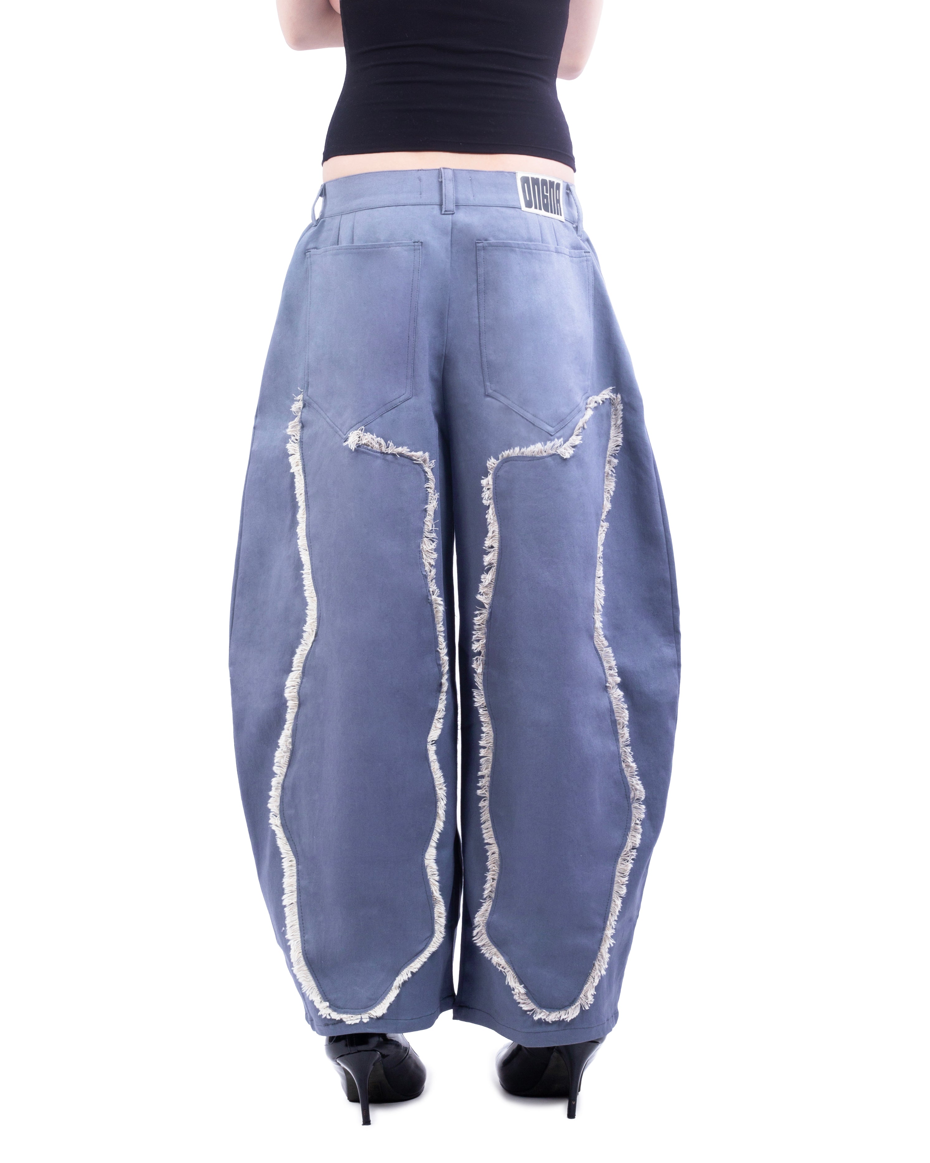 Blue jeans with white distressed details on a white background
