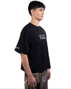 MODEL wearing ONGNA GOMD black t-shirt with text on a white background