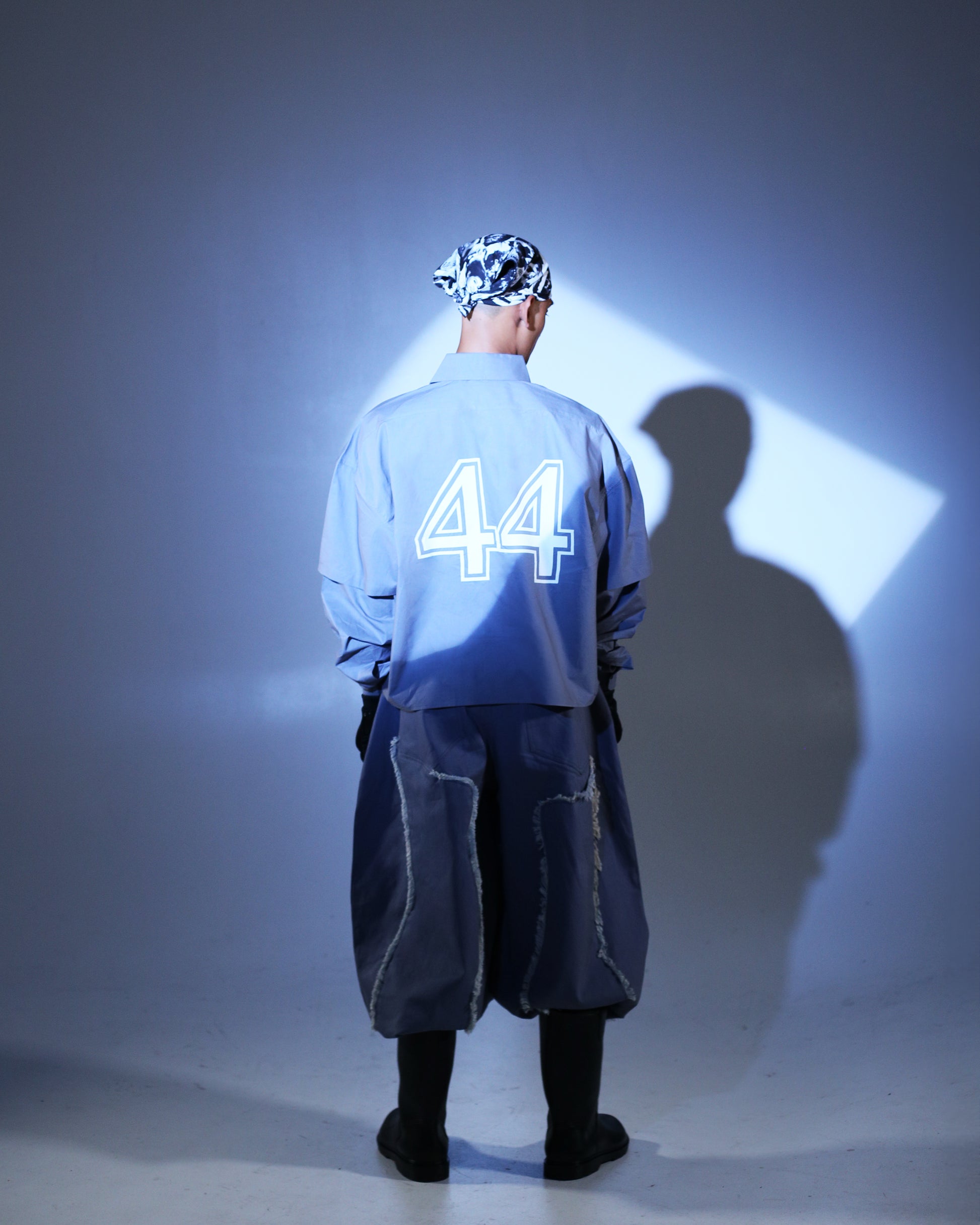 Model wearing ONGNA AABELI Pants styled with AABELI Shirt in Toronto streetwear look