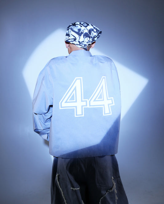 Model wearing ONGNA AABELI Shirt with 44 screen print.