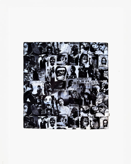 A black and white graphic print scarf with various images and text related to the theme of anarchy.