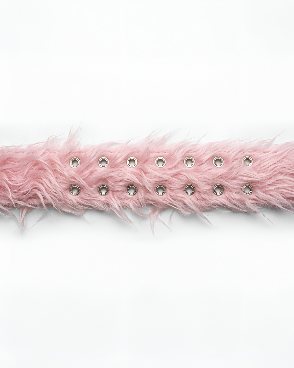A close-up of a light pink faux fur trim with silver metal grommets, laid horizontally against a plain white background.